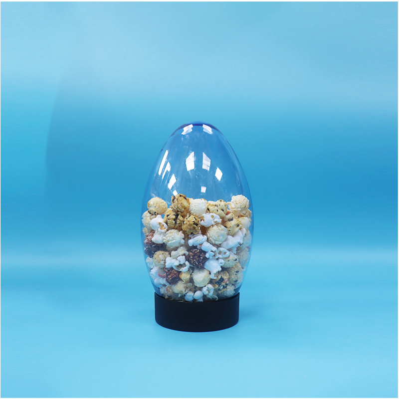 Caramelle in plastica a forma di uovo Popcorn di pistacchio Noce Caramelle Vaso a testa in giù Tappo piatto