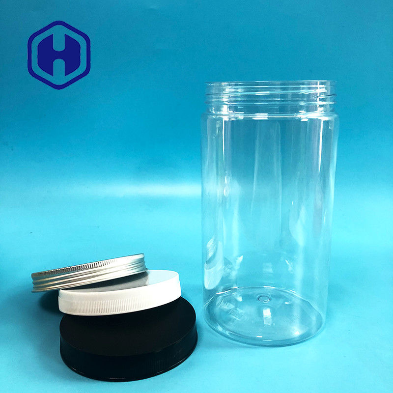 I chicchi di caffè delle mandorle del cereale di schiocco colano il barattolo di plastica della prova con il coperchio a vite